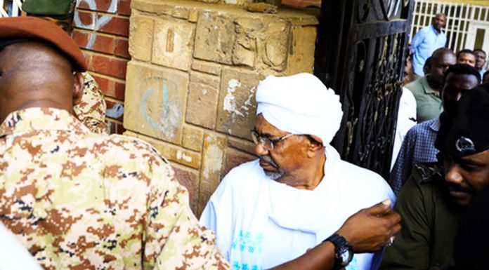 Sudan's ex-president Omar al-Bashir was charged with corruption-related offenses on Sunday as he appeared in public for the first time since he was overthrown in April.
